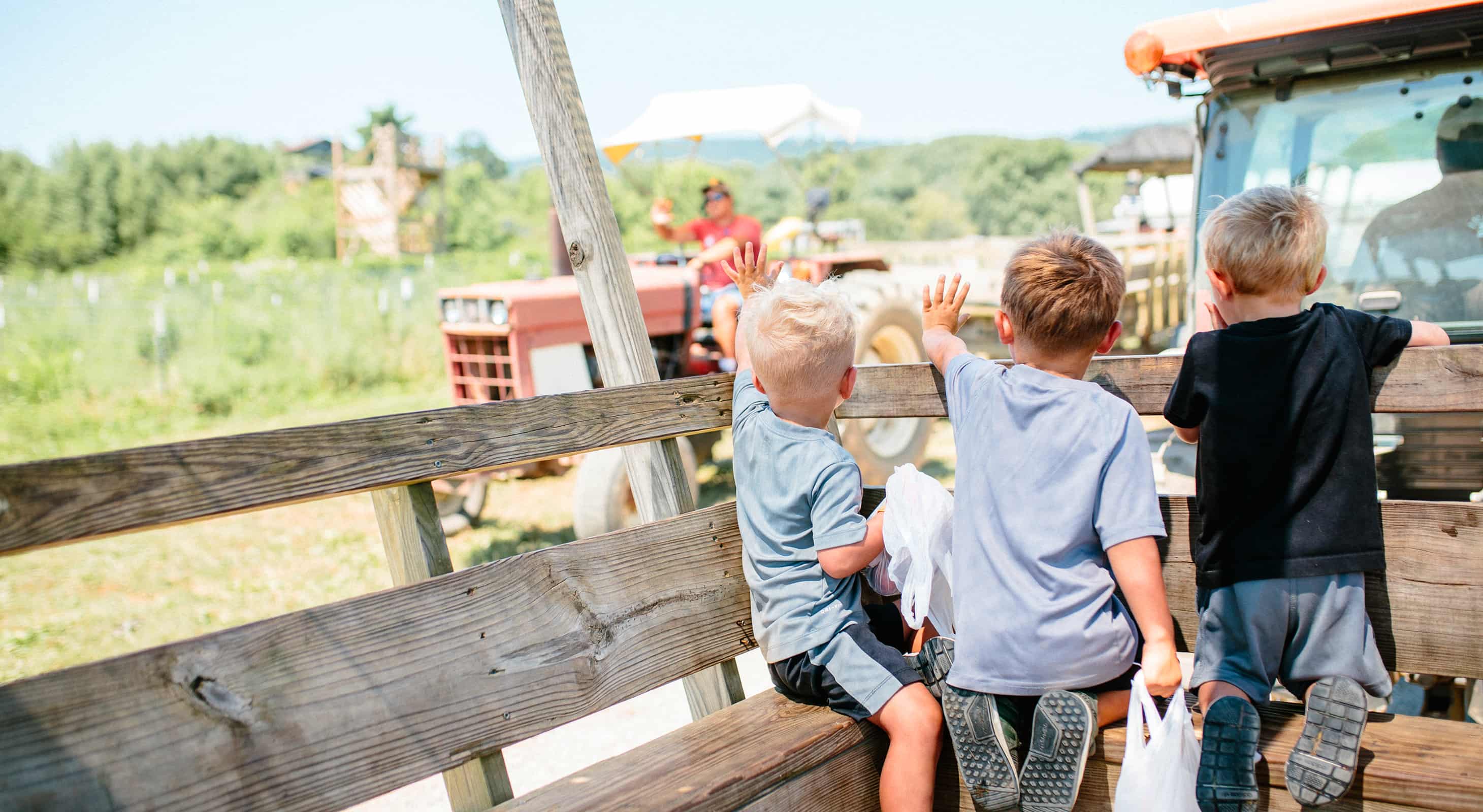 Kids on tractor ride at Great Country Farm