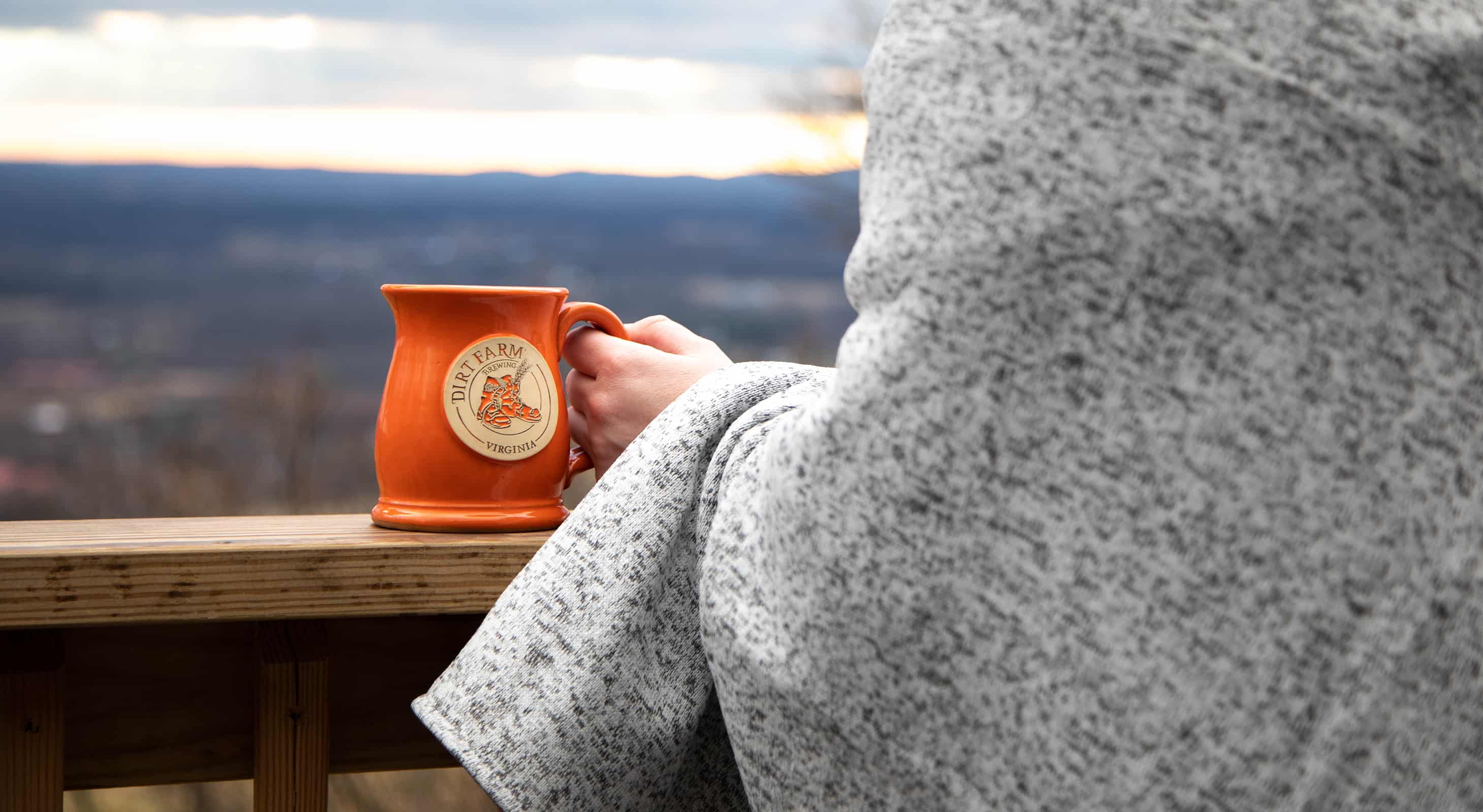Woman wrapped in blanket on a romantic Blue Ridge Mountains getaway