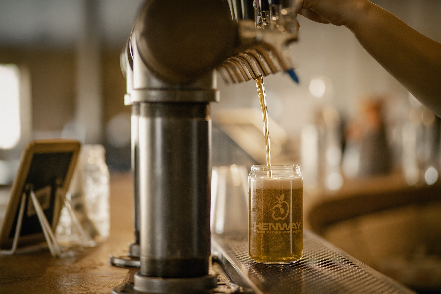 Ginger Snap Cider being pured from the tap into a Henway Hard Cider Glass