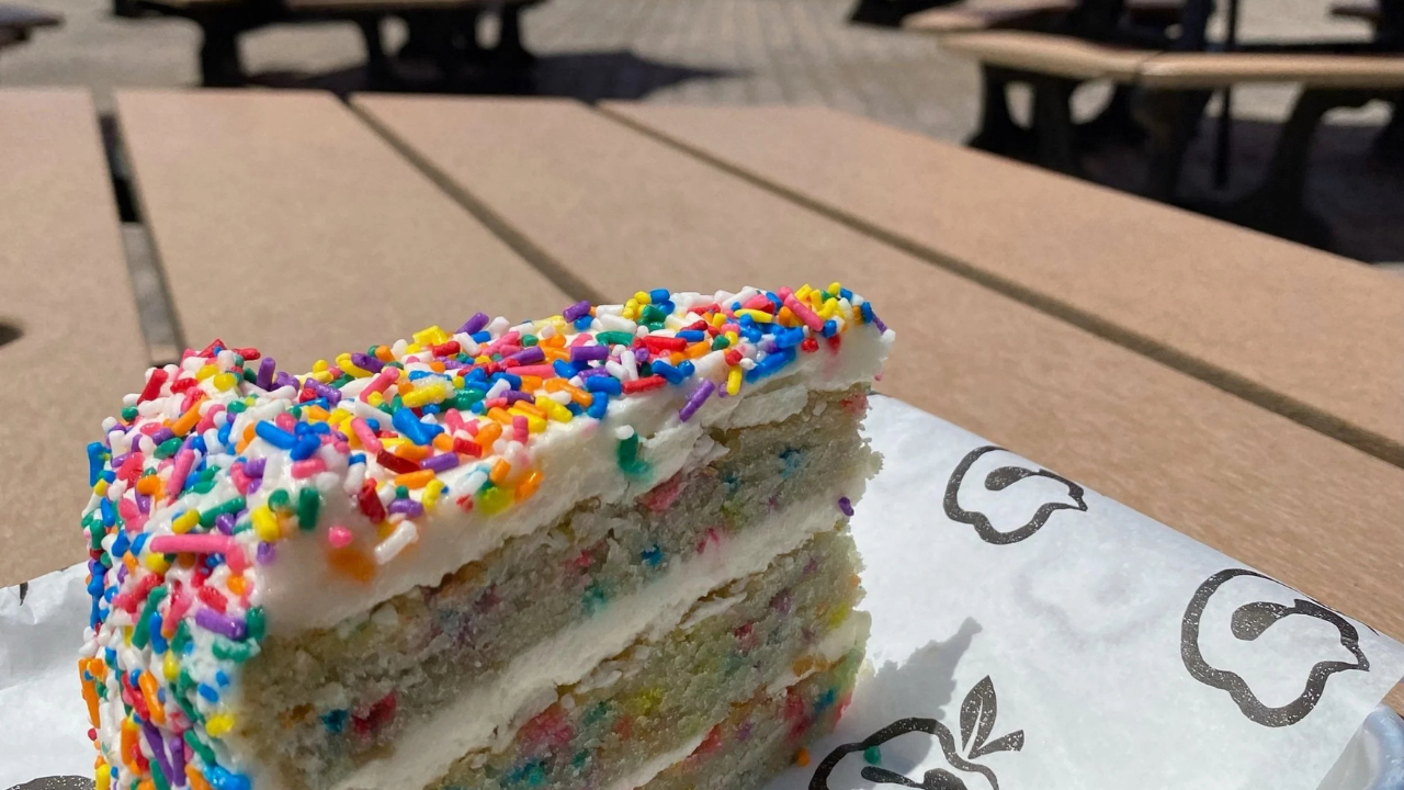 Happy Birthday Henway photo of a slice of birthday cake on a picnic table